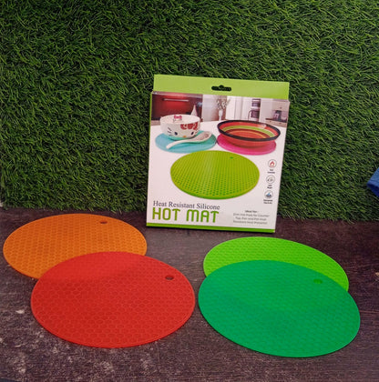 4 Pc Silicon Hot Mat For Placing Hot Vessels And Utensils Over It Easily Without Having Any Visible Marks On Surfaces.